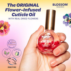 Applying Blossom Cuticle Oil to nails for conditioning cuticles