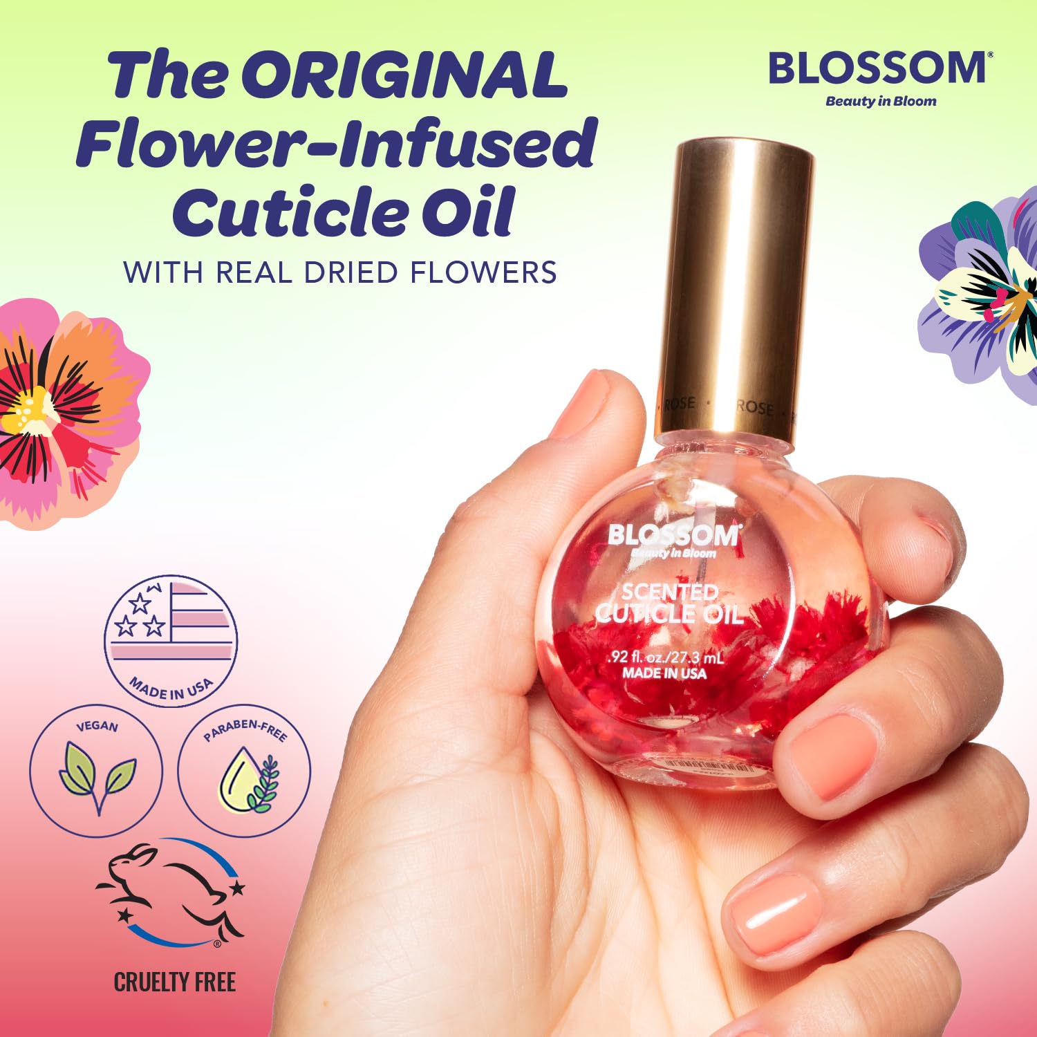 Close-up of dried flowers in Blossom Cuticle Oil for nail care.