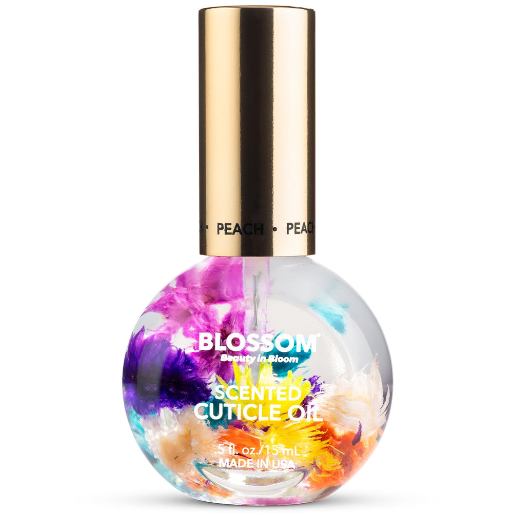 Blossom Cuticle Oil Juicy Peach bottle softens and nourishes nails