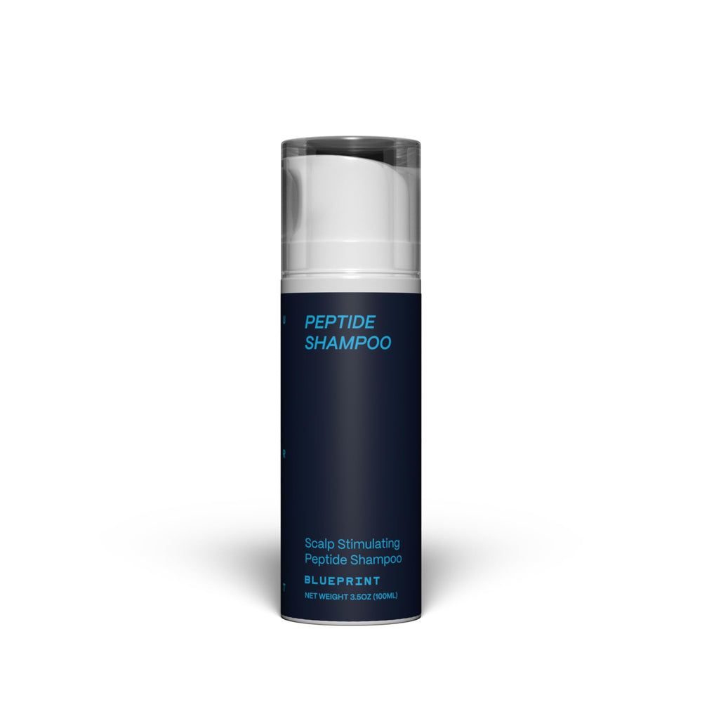 Blueprint Bryan Johnson peptide shampoo bottle demonstrates fragrance-free care for sensitive scalps.