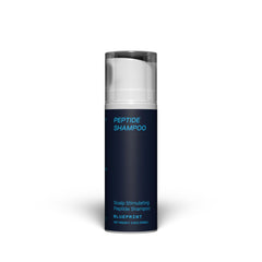 Blueprint Bryan Johnson peptide shampoo bottle demonstrates fragrance-free care for sensitive scalps.