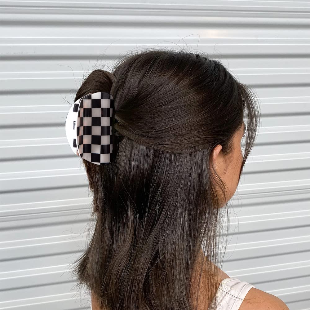 Bmobuo fashion-forward hair clip on a chic updo demonstrates versatile styling options.