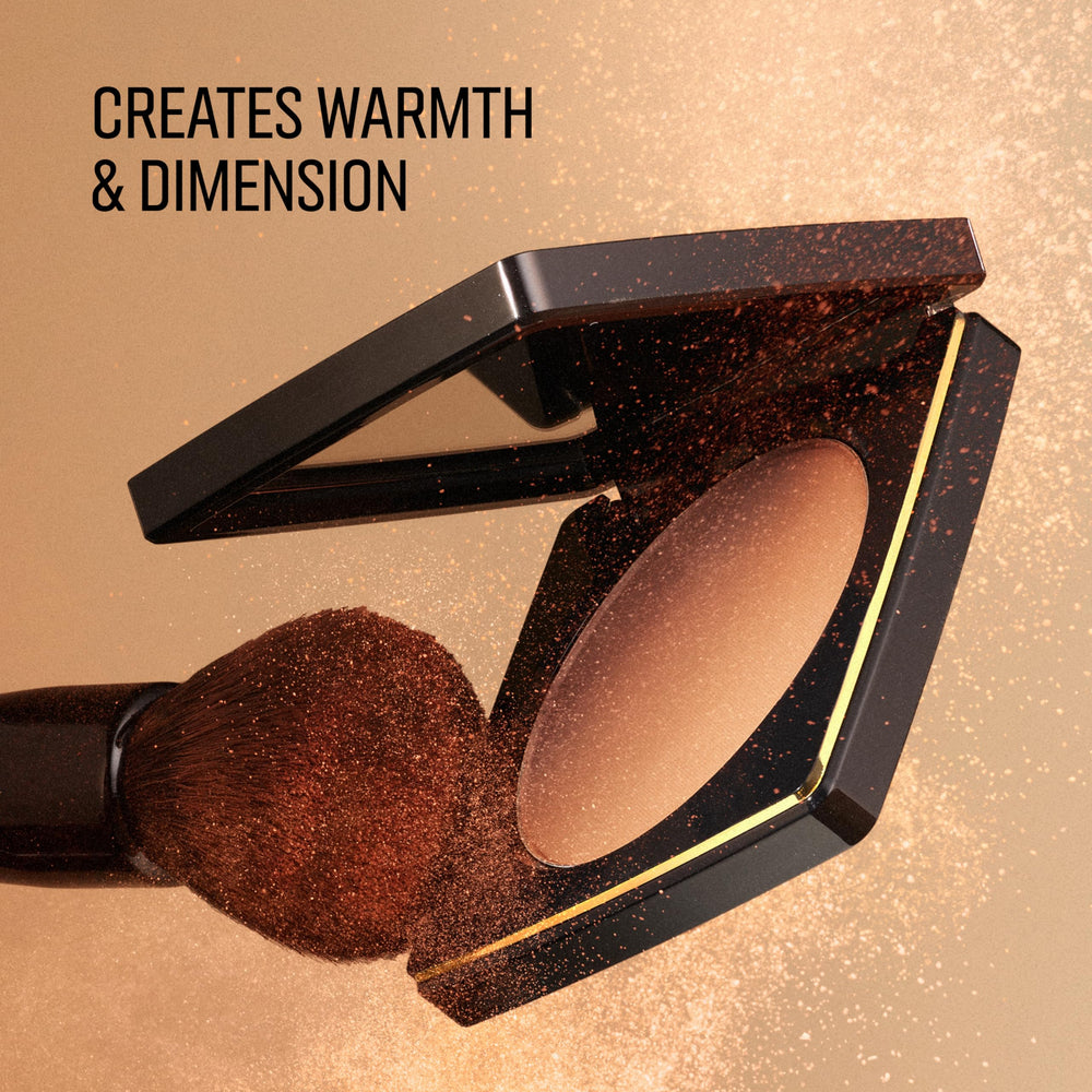 Bobbi Brown Bronzing Powder Golden Light packaging showcases universal warmth.