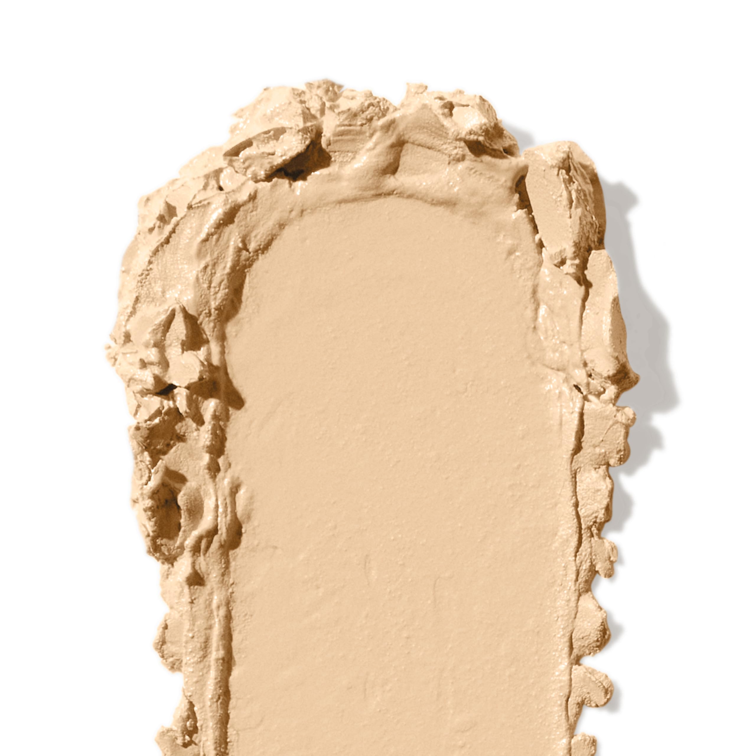 Bobbi Brown concealer stick close-up showing seamless blend and skin-like finish.