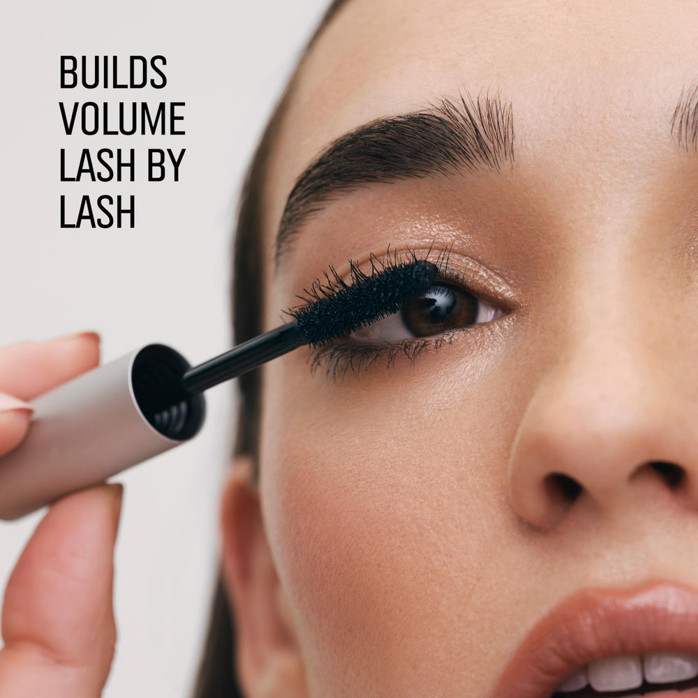 Bobbi Brown Smokey Eye Mascara wand in use provides precise application.