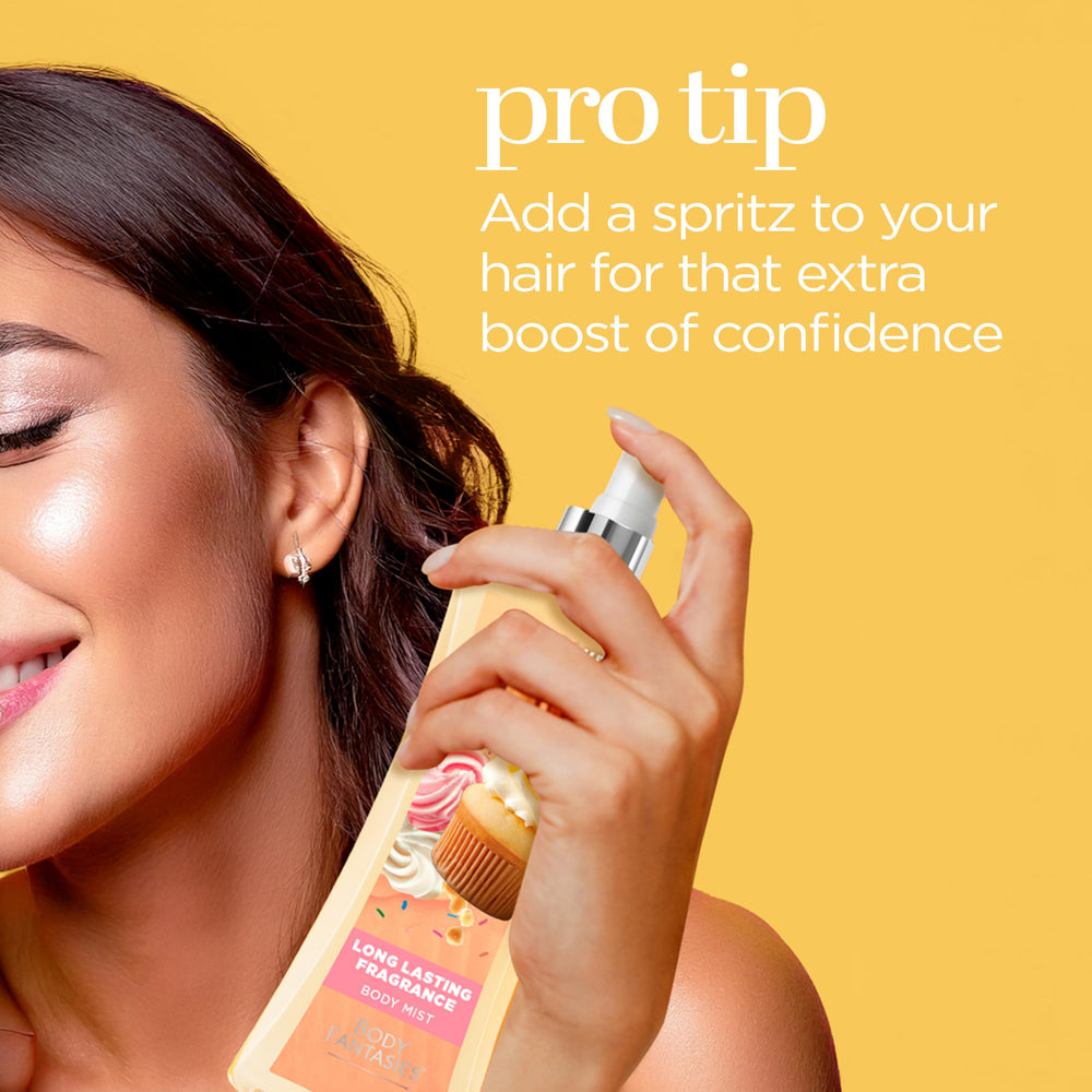 Body Fantasies Cupcake Swirl mist in hand suggests travel-friendly use