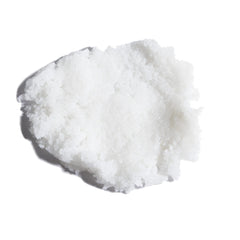 Body Prescriptions Men's exfoliating scrub texture closeup highlighting exfoliation