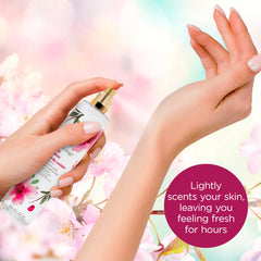 Bodycology Cherry Blossom Mist application on wrists and neck.