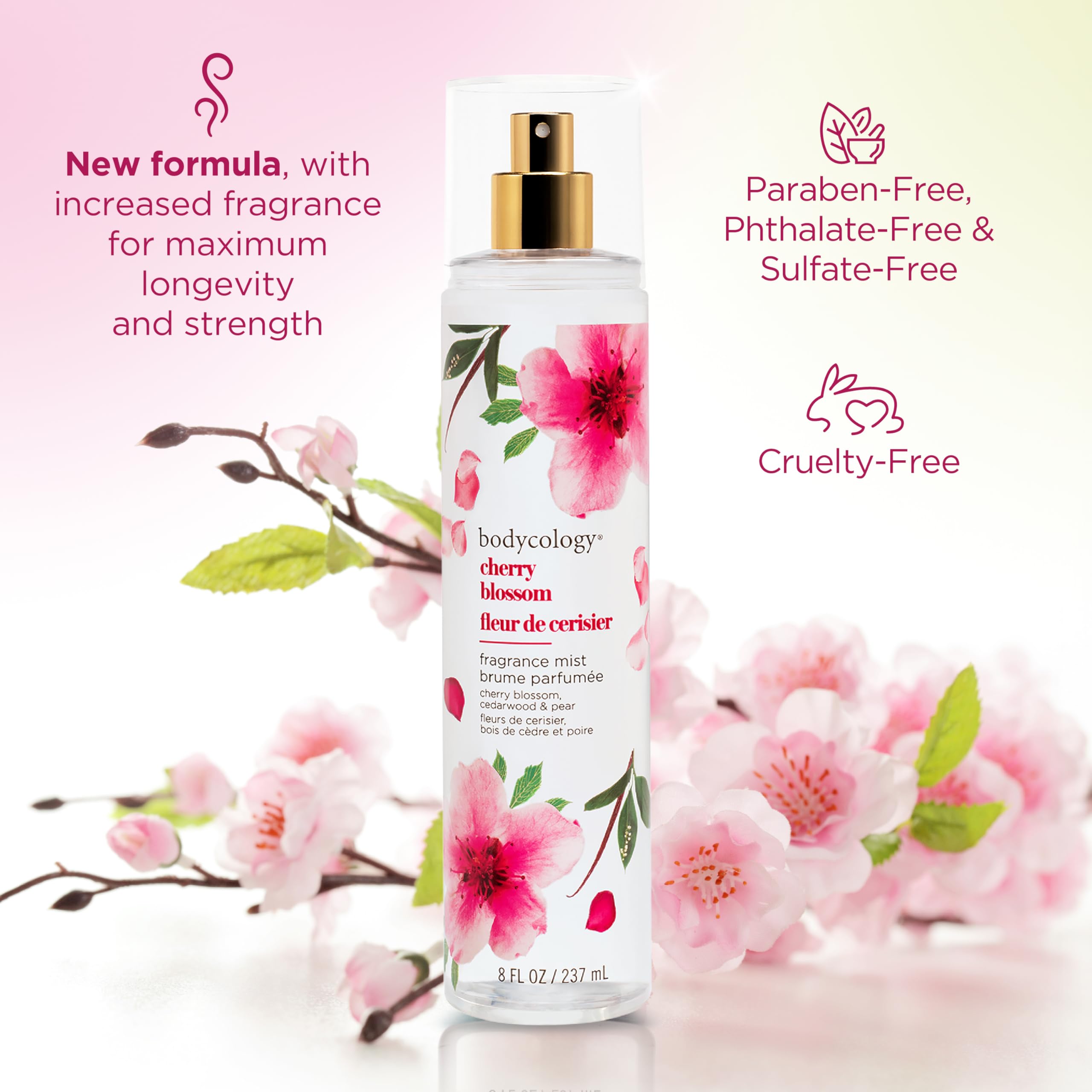 Bodycology Cherry Blossom Mist spray dispersing into air.