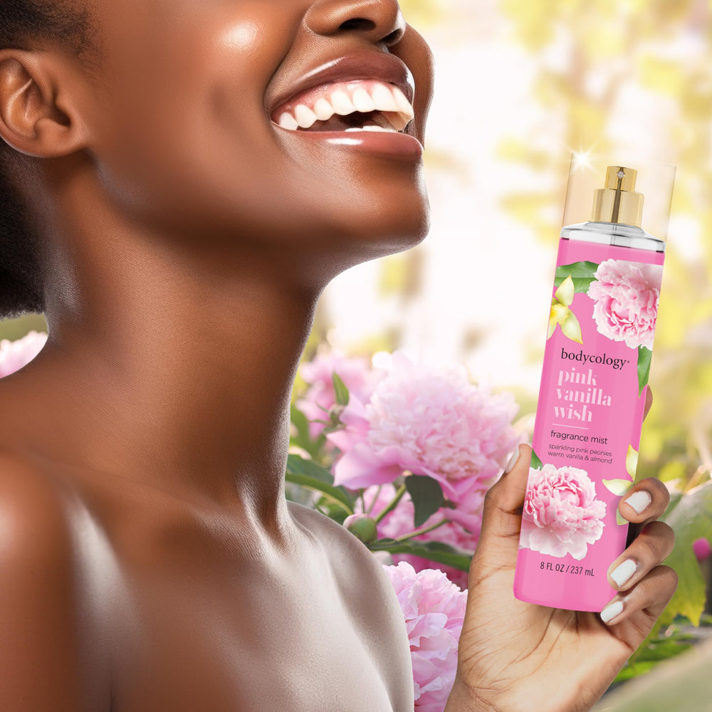 Bodycology Pink Vanilla Wish spray action releasing a fine mist.