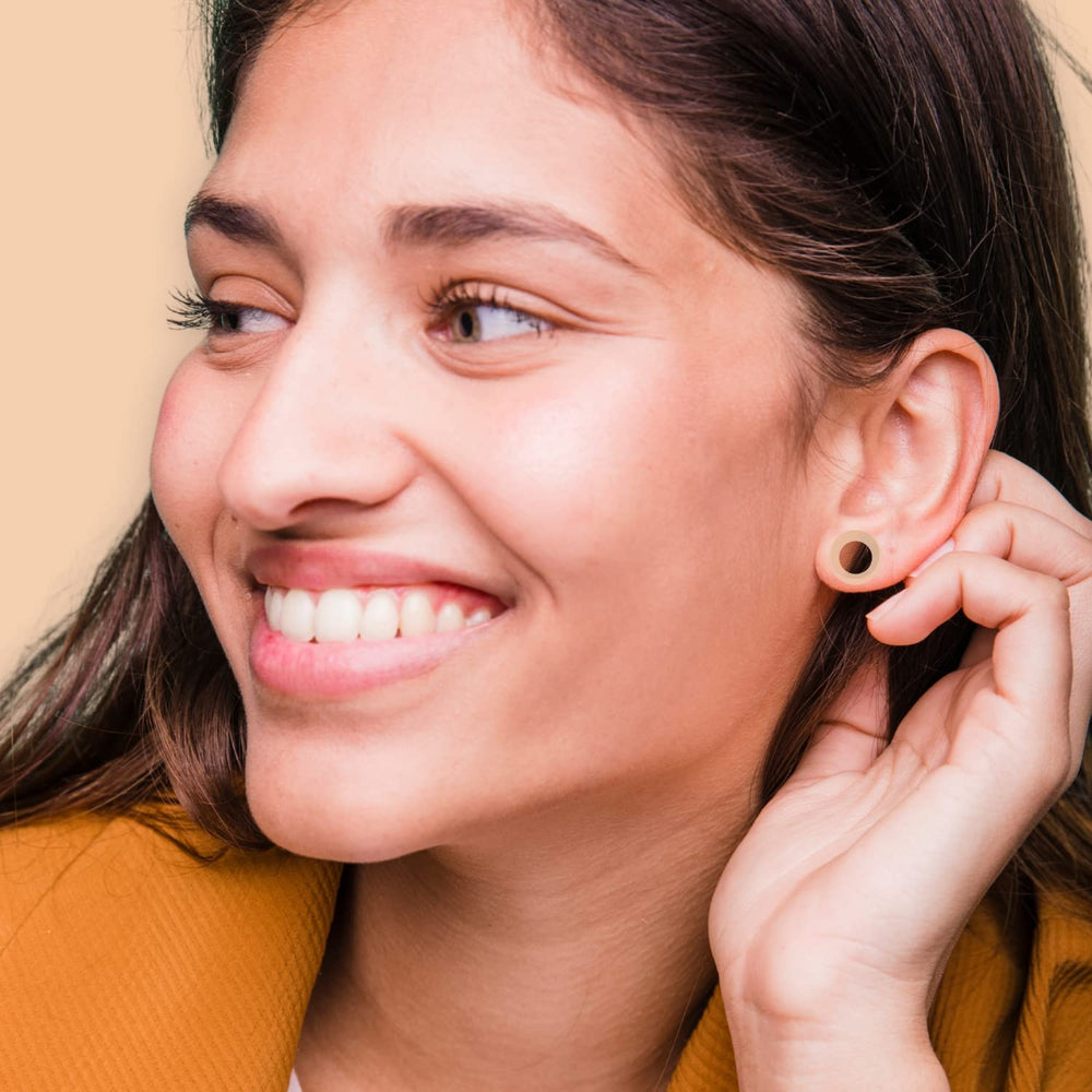 BodyJ4You jojoba oil on ear piercing for soothing care