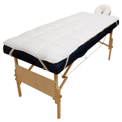 Body Linen Abundance Deluxe face rest cover on cushion for hygienic sessions.