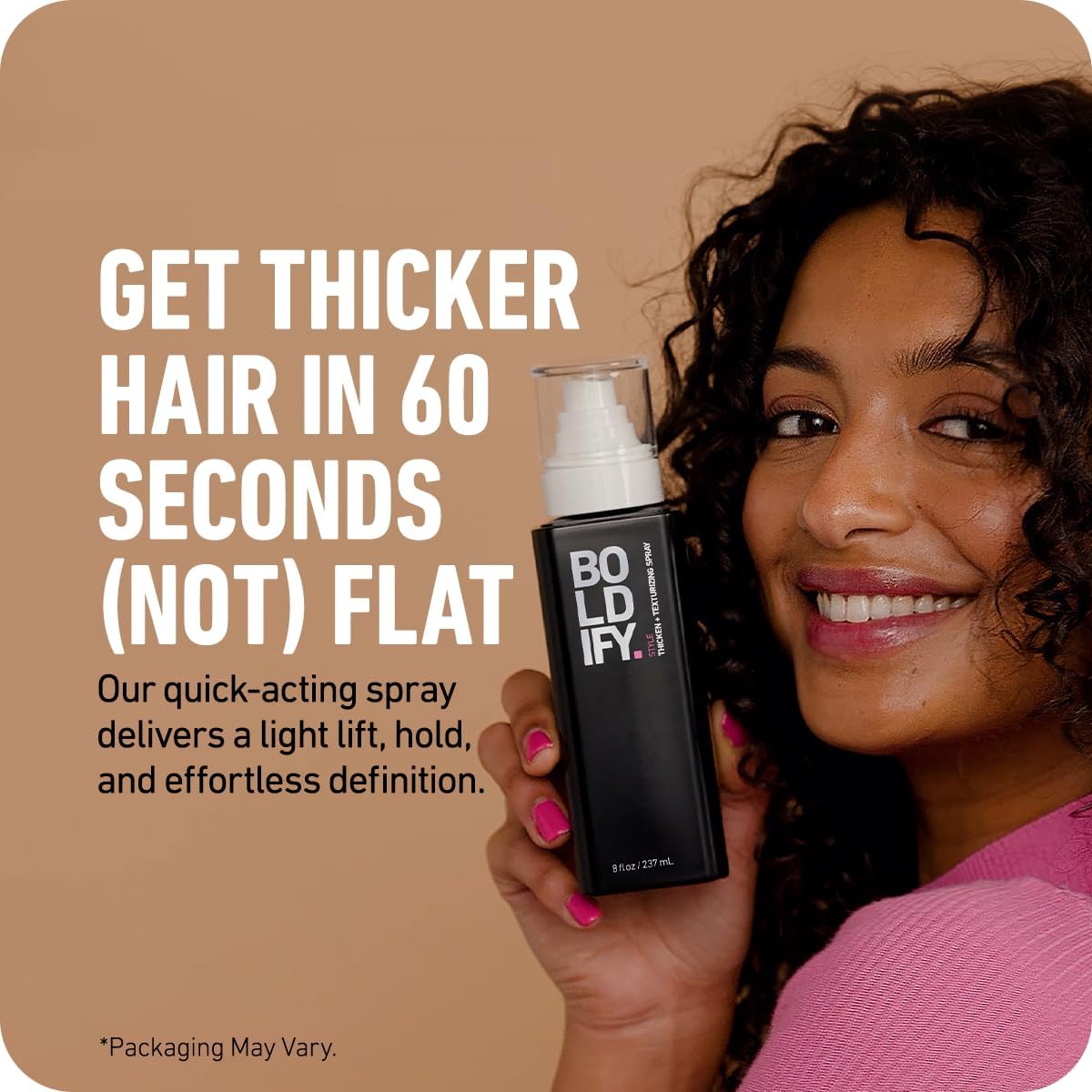 Boldify Thickening Spray mist on hair delivering natural texture and lift.