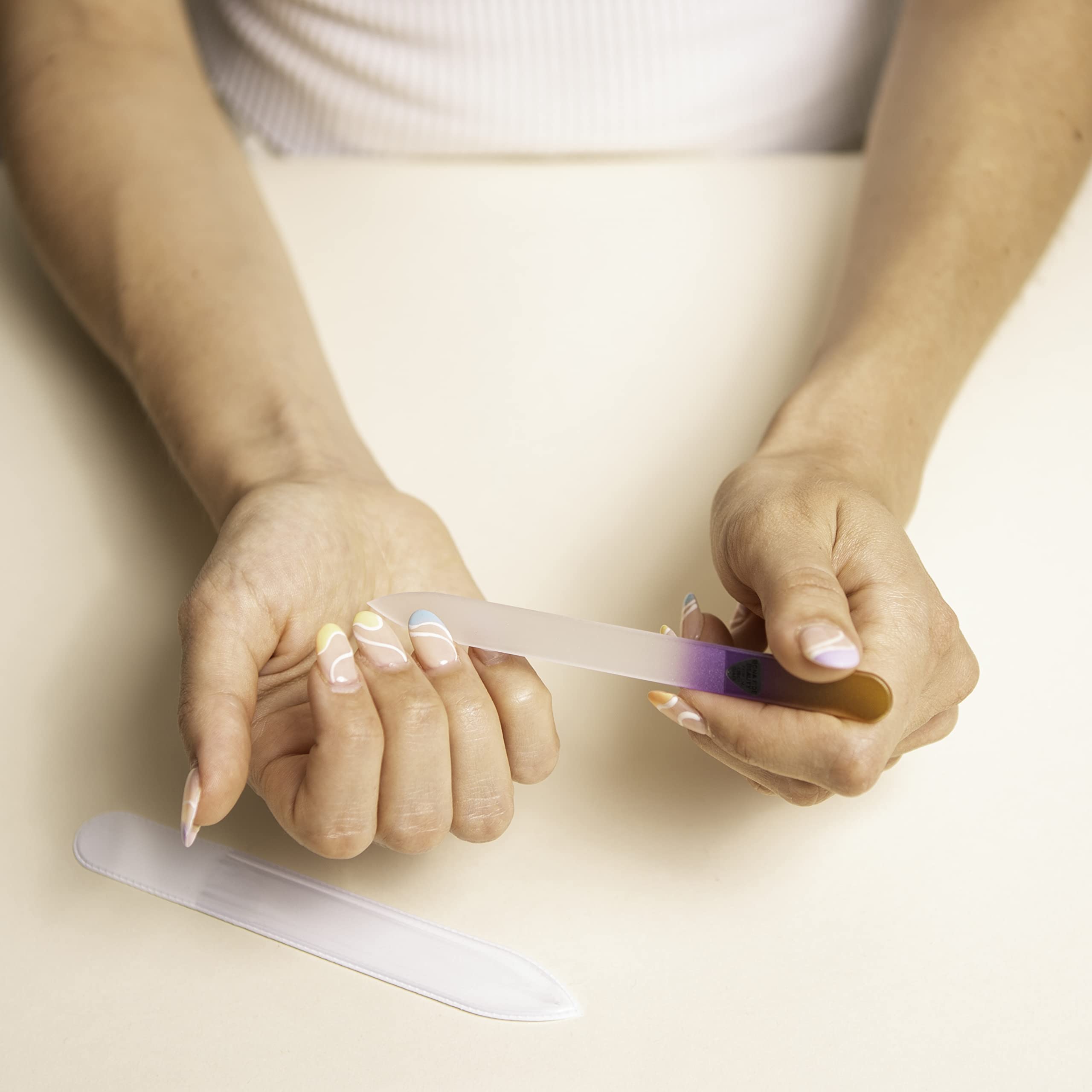 Bona Fide Beauty crystal glass file delivers salon-like finish on nails.