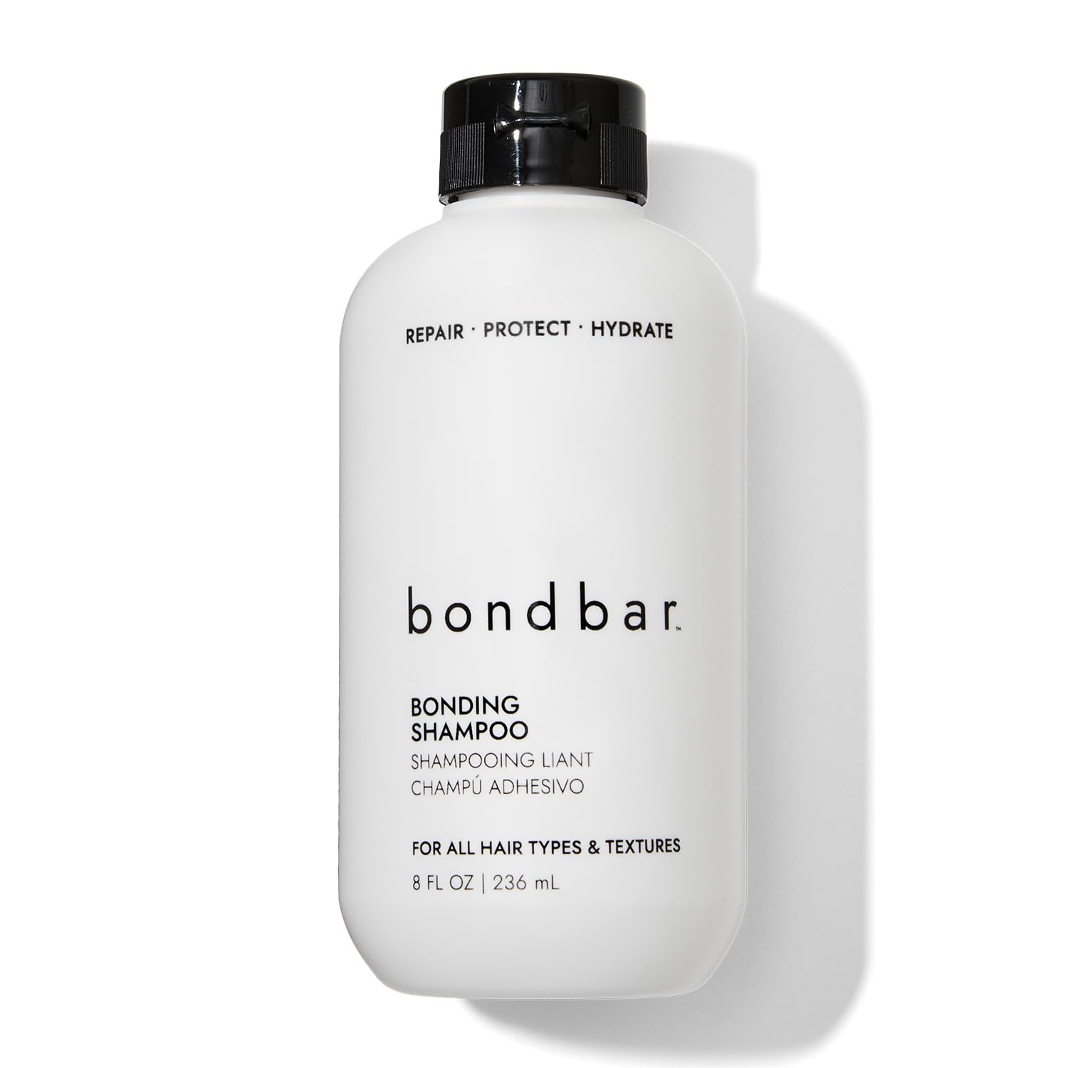 Bondbar Champú Reparador en botella, ideal para uso diario y cuidado suave.