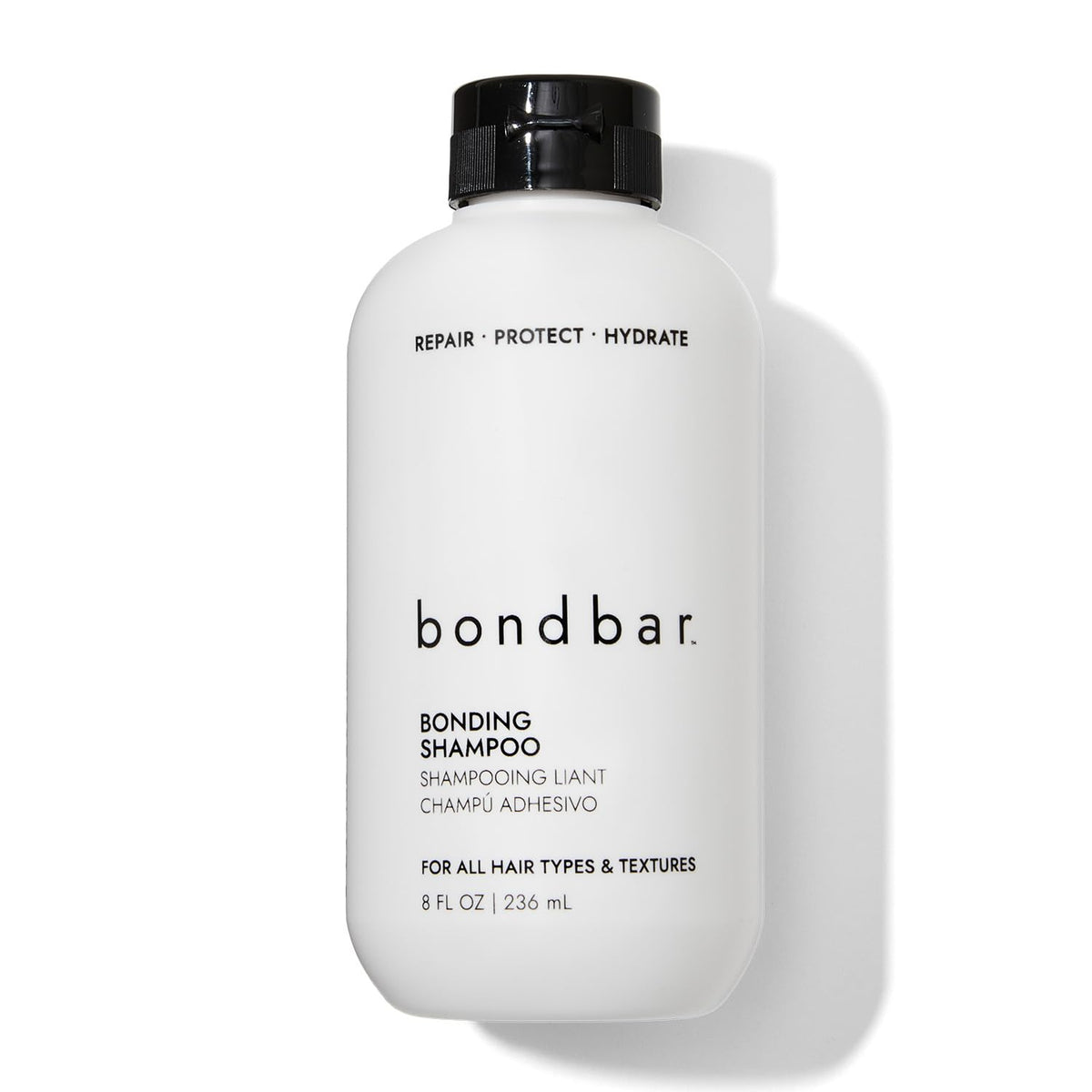 Bondbar Champú Reparador en botella, ideal para uso diario y cuidado suave.