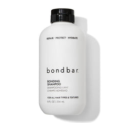 Bondbar Champú Reparador en botella, ideal para uso diario y cuidado suave.