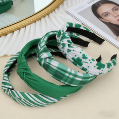 Bookay diadema verde para niñas, estilo festivo y ajuste suave.