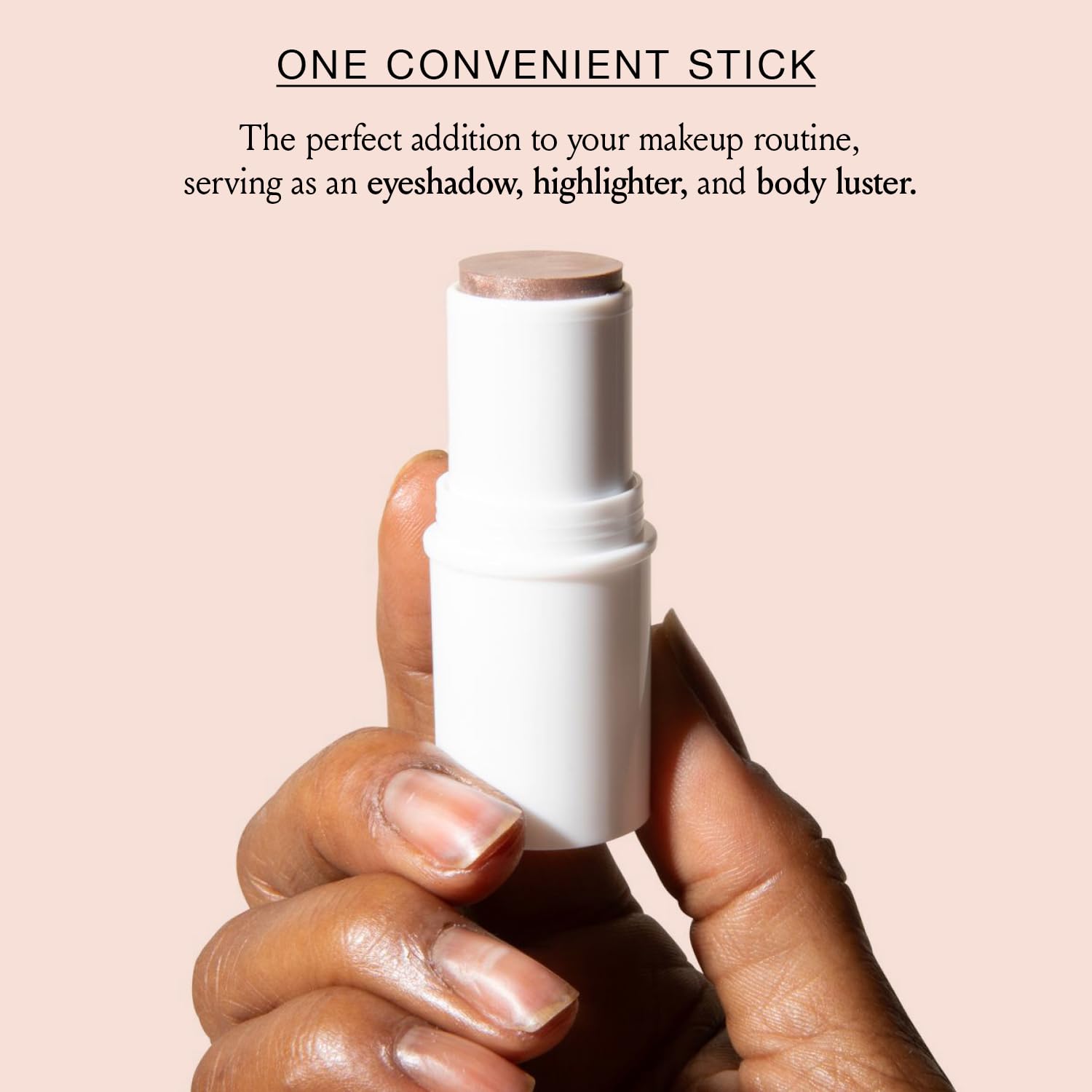 BOOM! Boomstick Glimmer beside a lipstick for cohesive, on-the-go glow.