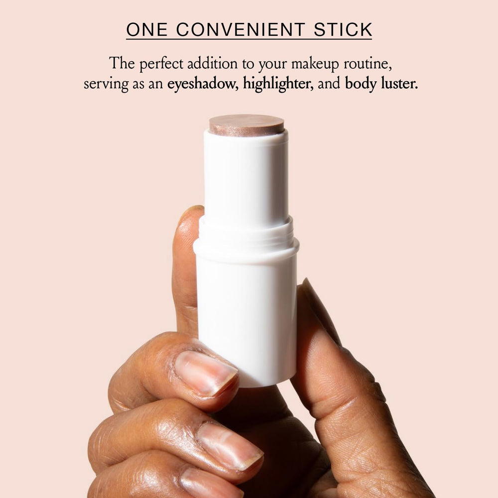 BOOM! Boomstick Glimmer beside a lipstick for cohesive, on-the-go glow.