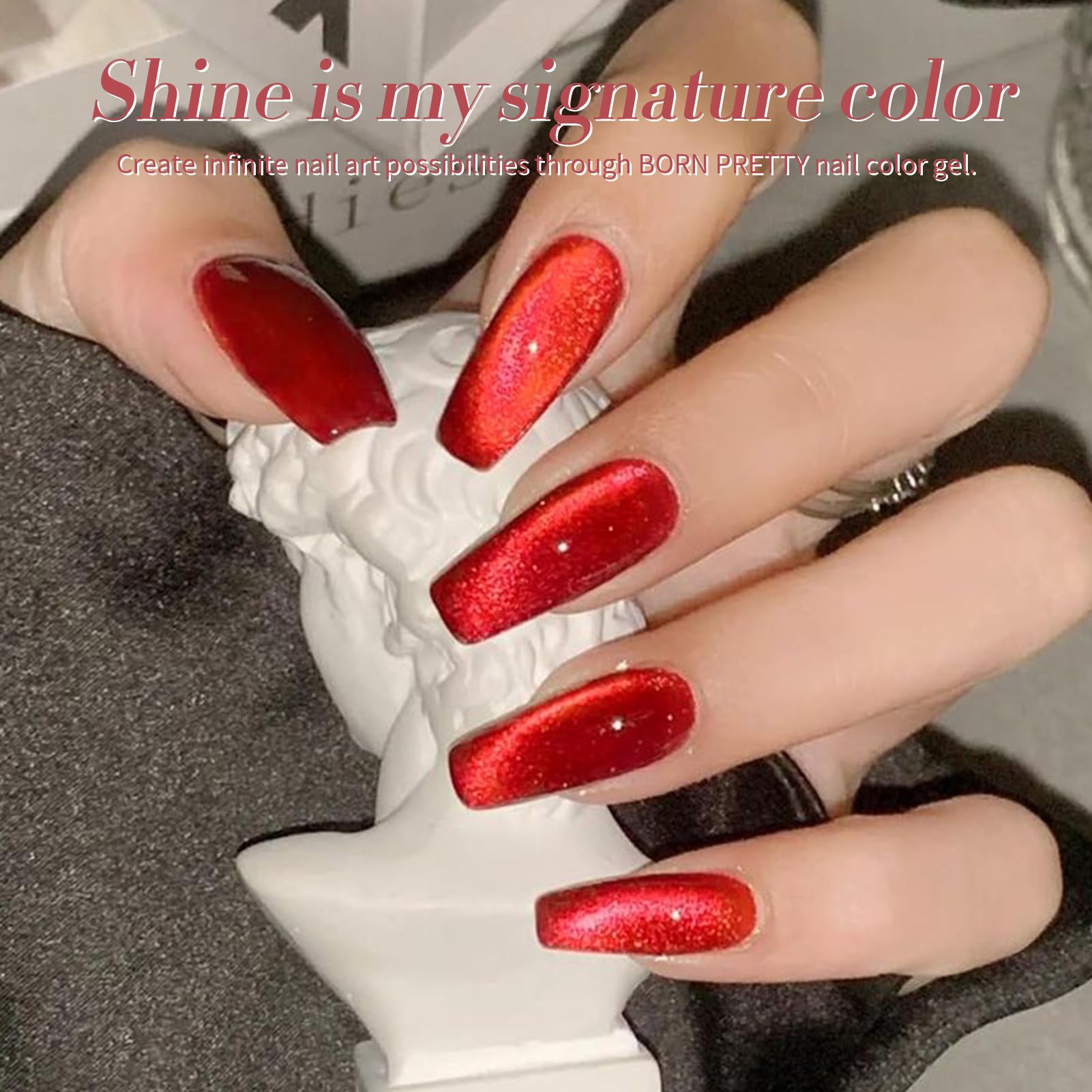 Born Pretty magnetic red polish creating cat-eye shifts with magnets.