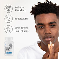 Close-up of BosleyMD capsules highlighting biotin and minerals for hair strength.