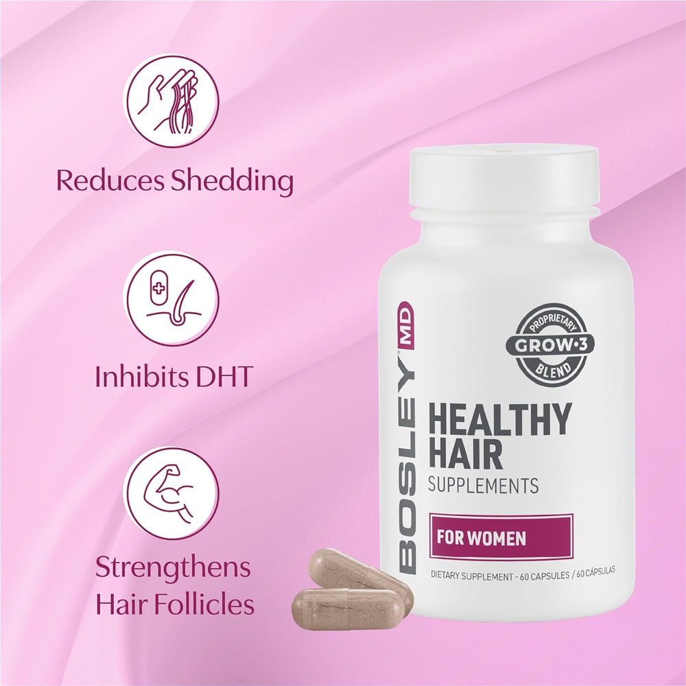 BosleyMD healthy hair capsules on a surface with water conveys simple daily wellness routine.