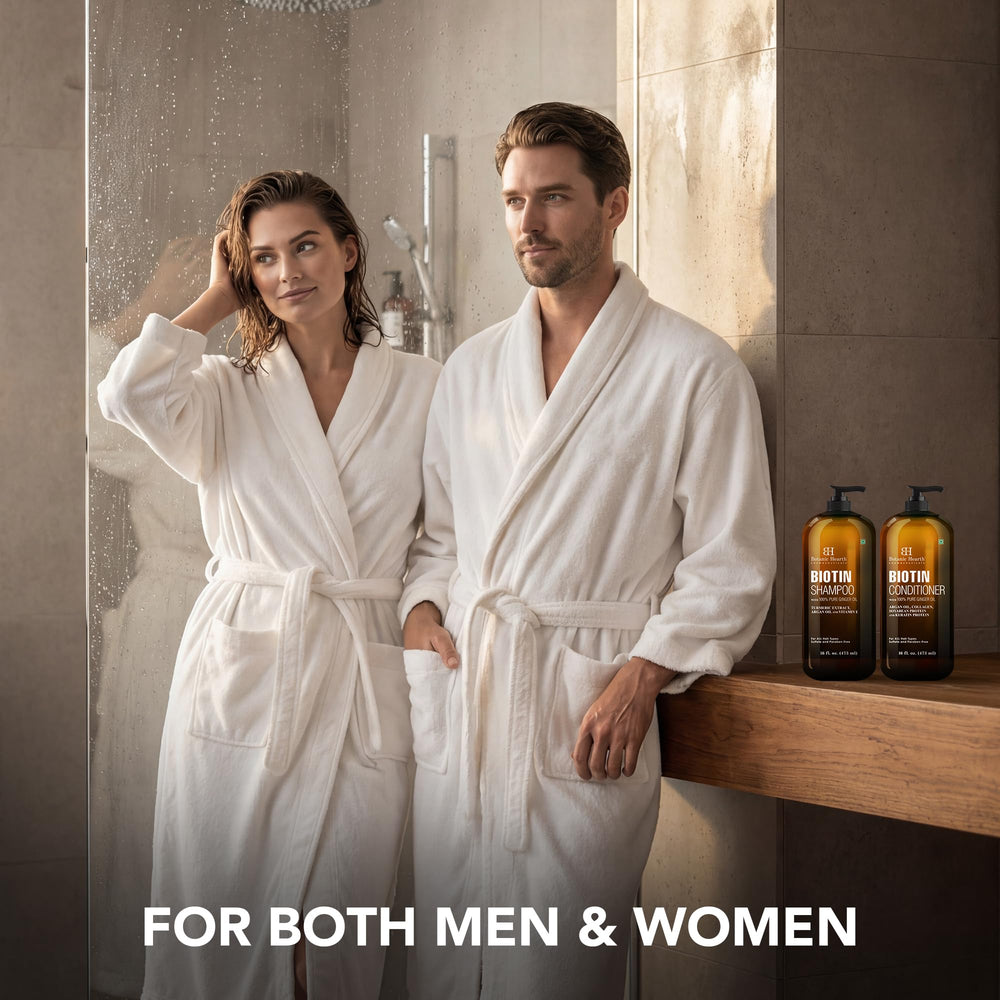 Botanic Hearth Biotin Shampoo product lather shown in hand with creamy texture.