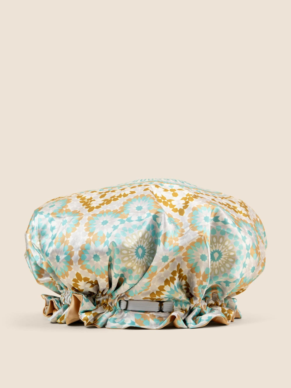 Bounce Curl reversible bonnet displays pattern change for styled versatility