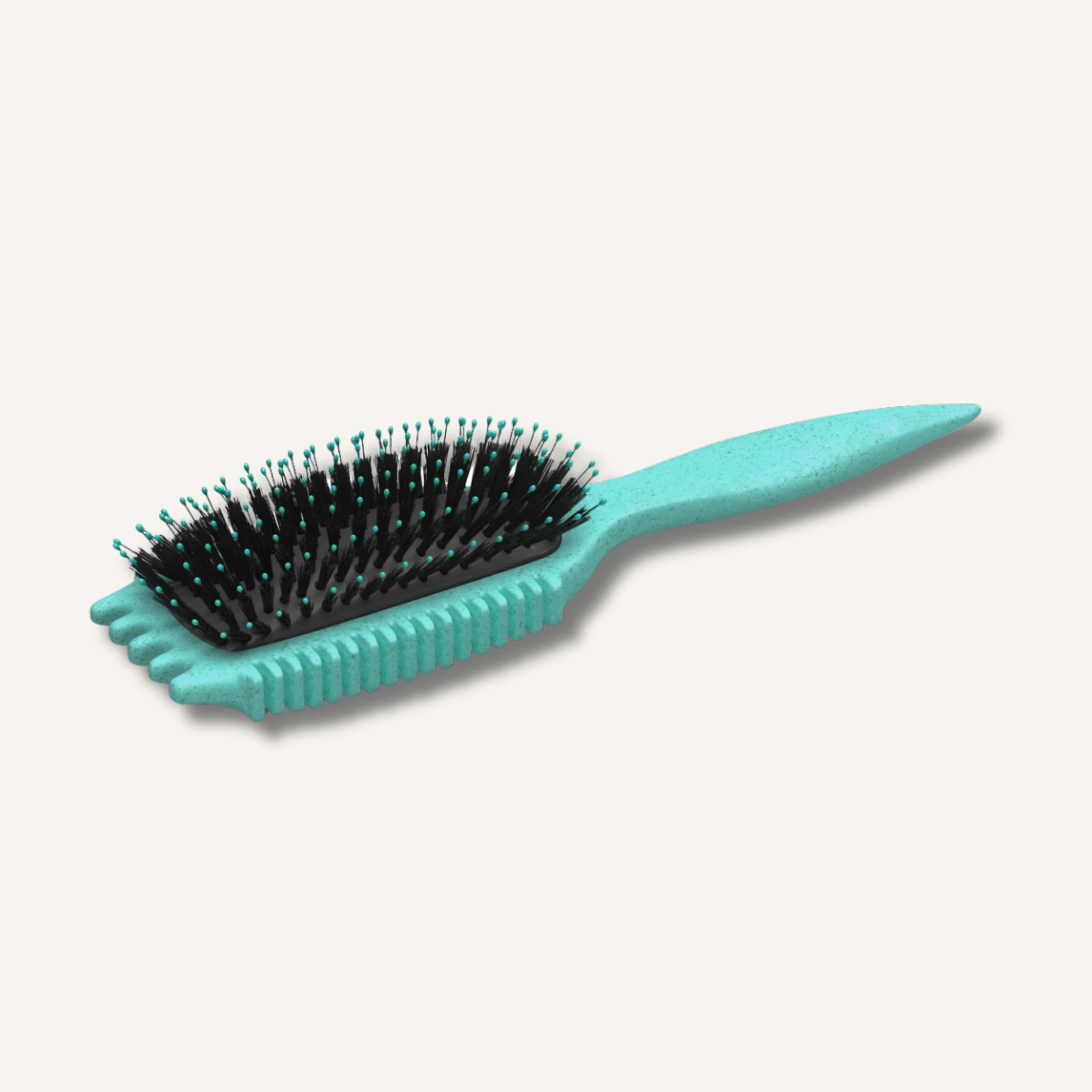 Bounce Curl Volume EdgeLift Brush thicker pad boosts durability during use.
