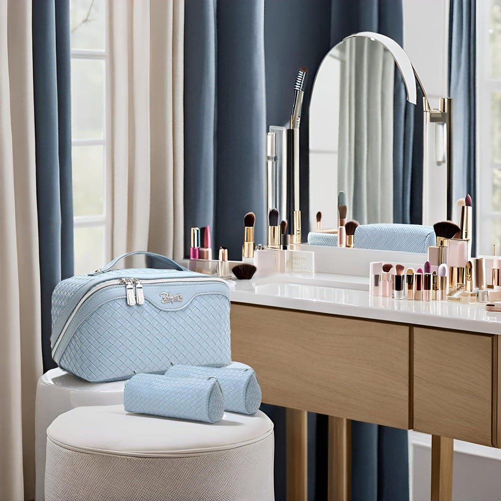 BOYATU light-blue compact bag in a bathroom scene.