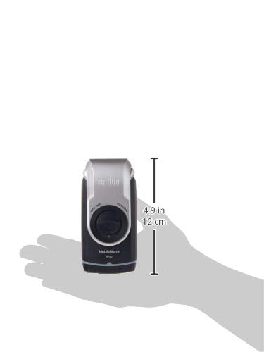 Braun M90 MobileShave in use in car or office for quick grooming