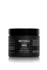 Brickell Hair Styling Clay Pomade tin close-up showing strong hold