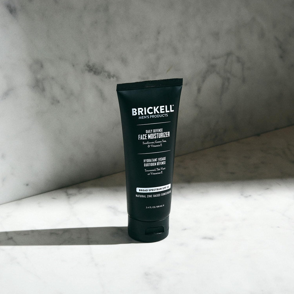 Brickell Men's Daily Defense moisturizer in a 3.4oz jar supports daily hydration and protection.