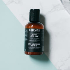 Brickell Men's Instant Relief Aftershave 2 oz packaging image highlighting portable travel size.