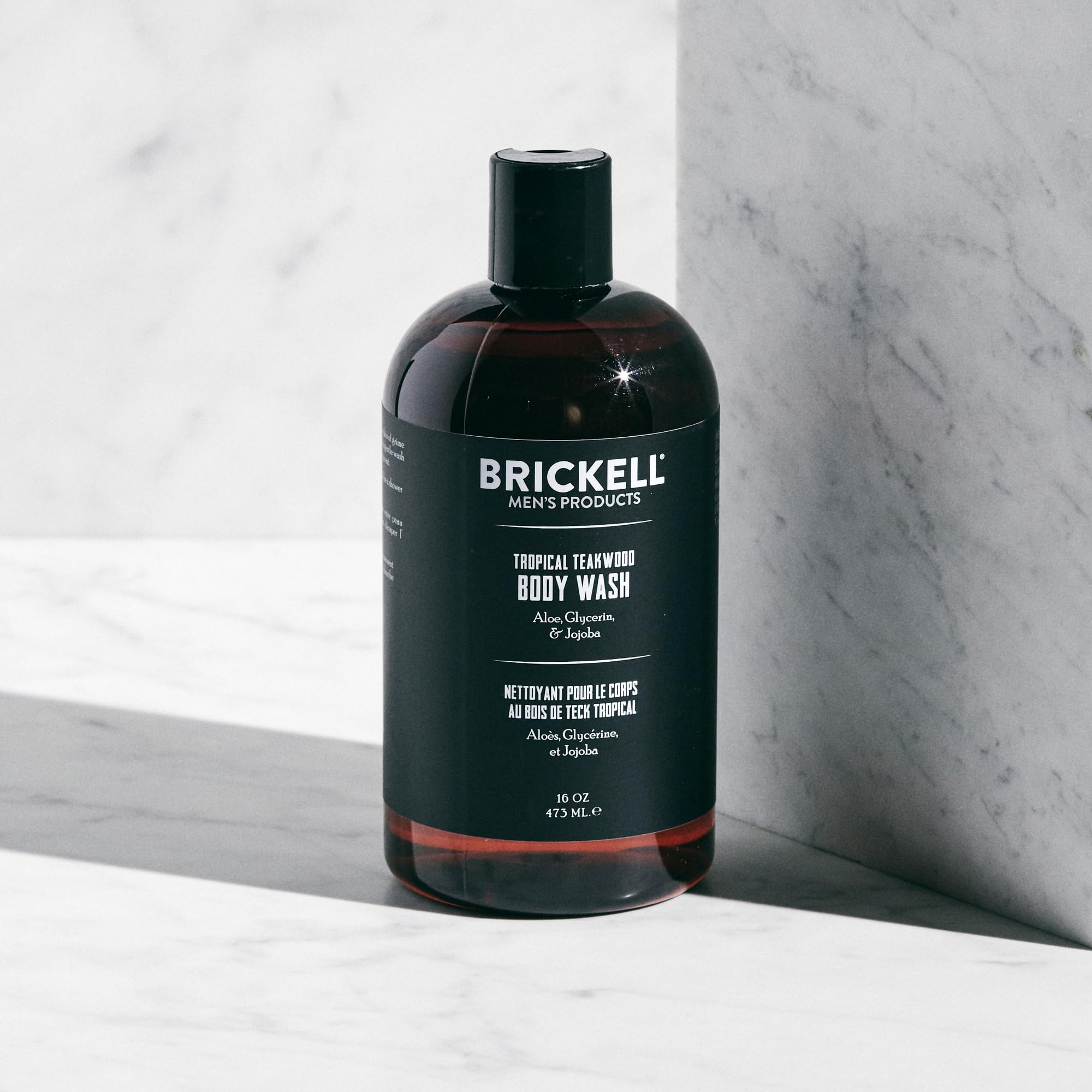 Brickell Men's Invigorating Body Wash lather showing rich bubbles for a deep-clean feel.