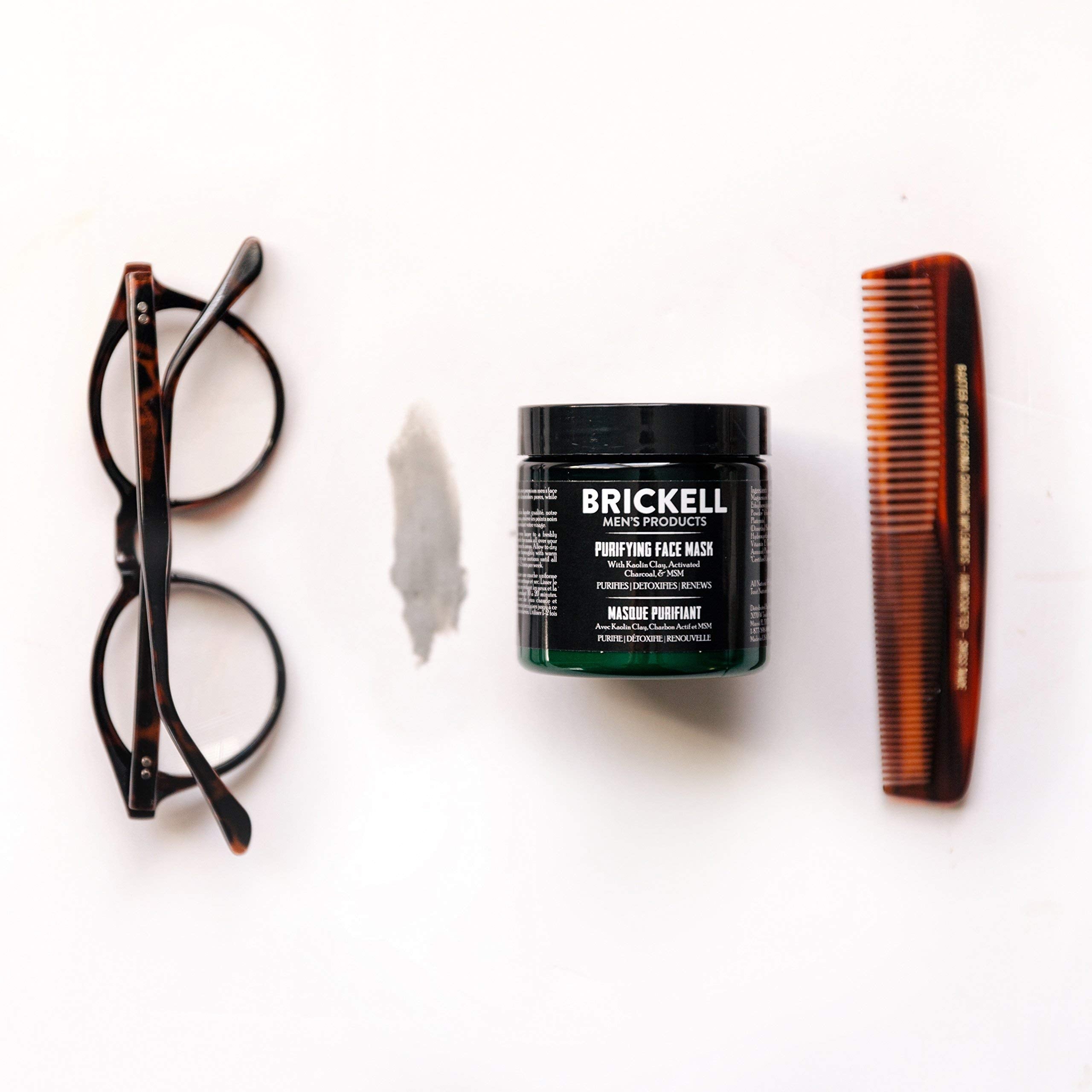 Brickell Men's Purifying Charcoal Face Mask activated charcoal close-up for deep cleansing.
