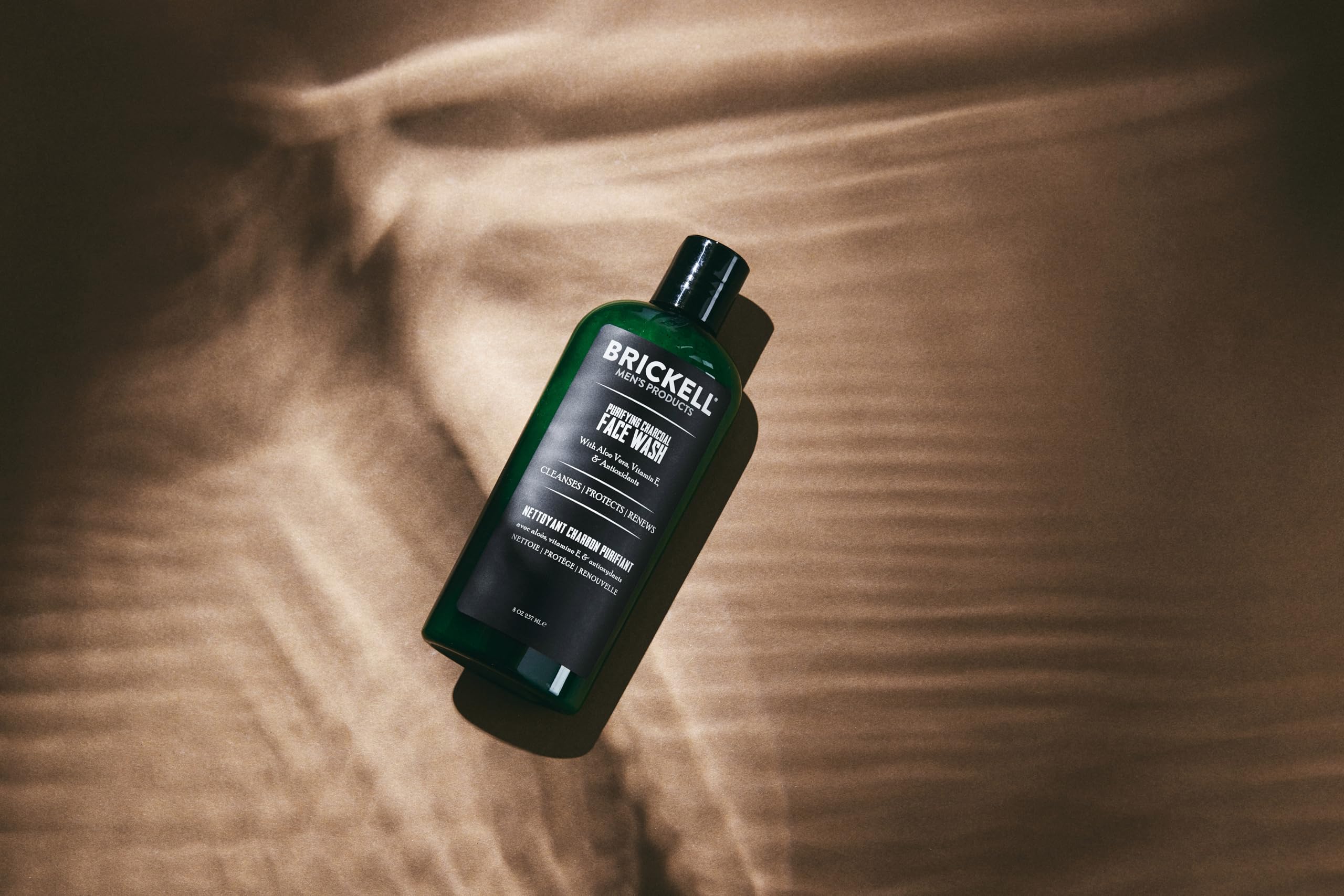 Close-up of foam from Brickell charcoal face wash for pore cleansing.