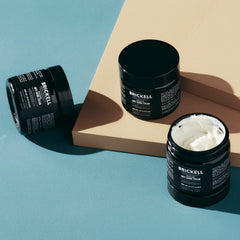 Brickell Men's Revitalizing Anti-Aging Cream on dry skin area showing smoothing