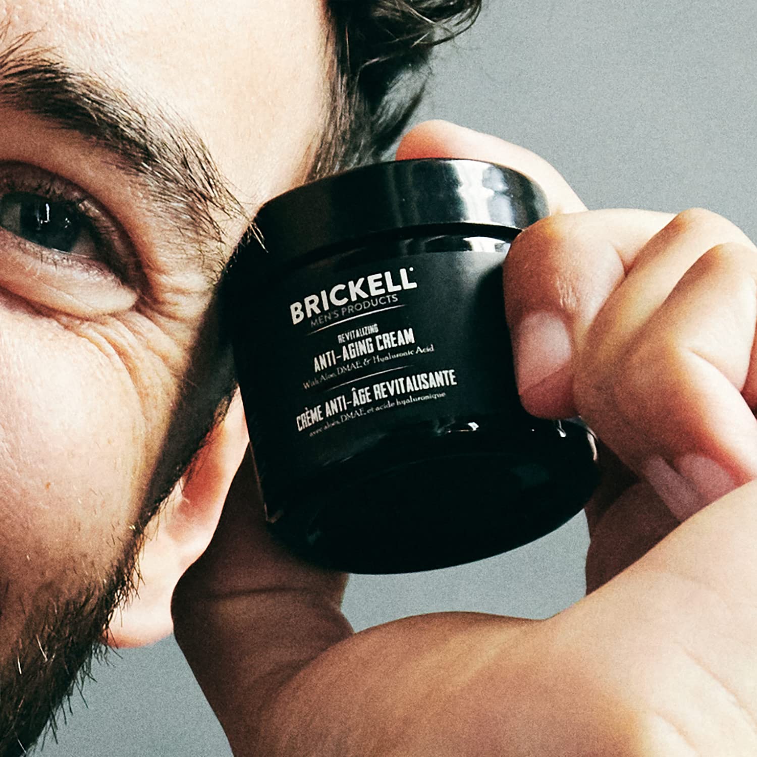 Man applying night cream as part of his routine