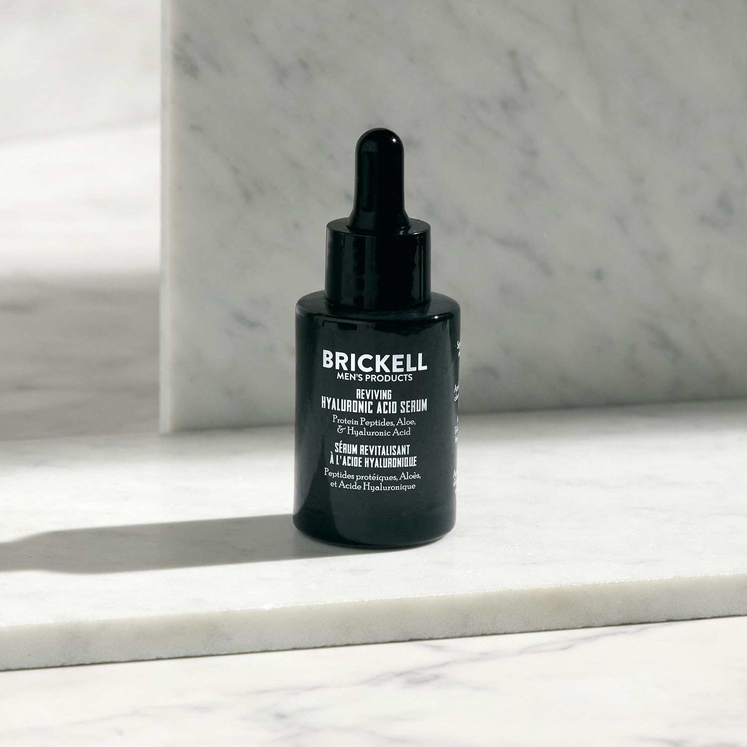 Brickell Serum ingredients peptides vial close-up emphasizing natural formula.