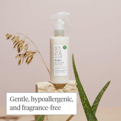 Be Gentle Be Kind milky spray texture on hair indicating lightweight moisture.
