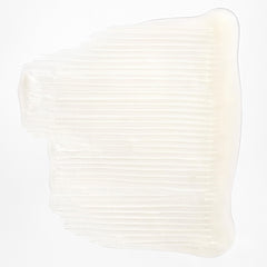 Creamy lather from Briogeo Curl Charisma close-up on defined curls.
