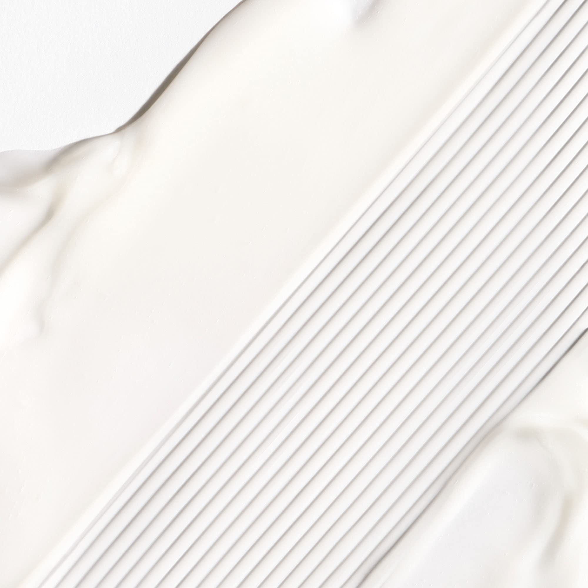 Close-up of creamy texture shows Briogeo Don't Despair, Repair! deep conditioning.
