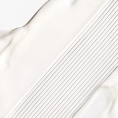Close-up of creamy texture shows Briogeo Don't Despair, Repair! deep conditioning.