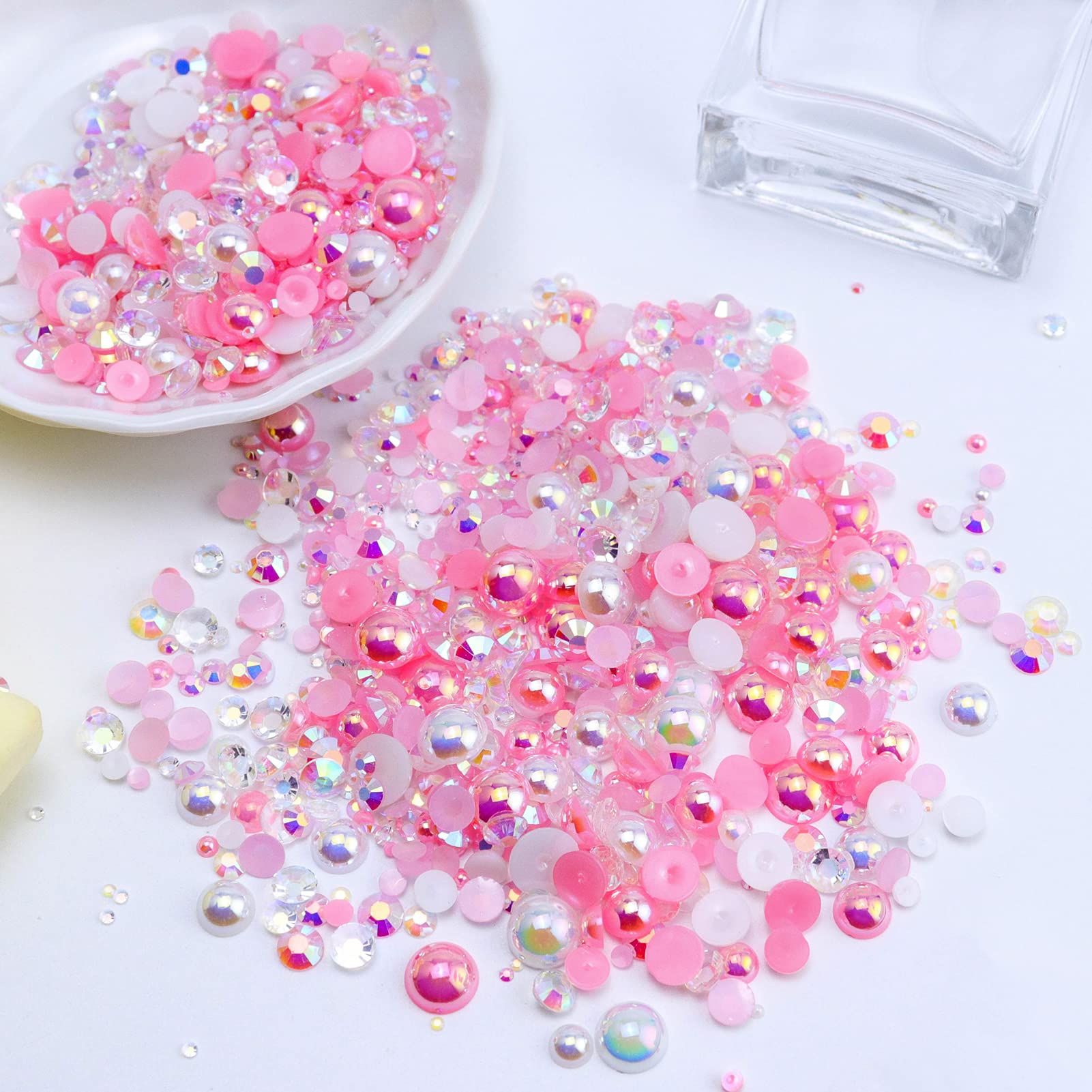 Briskbloom tweezers help lift large rhinestones and pearls securely.