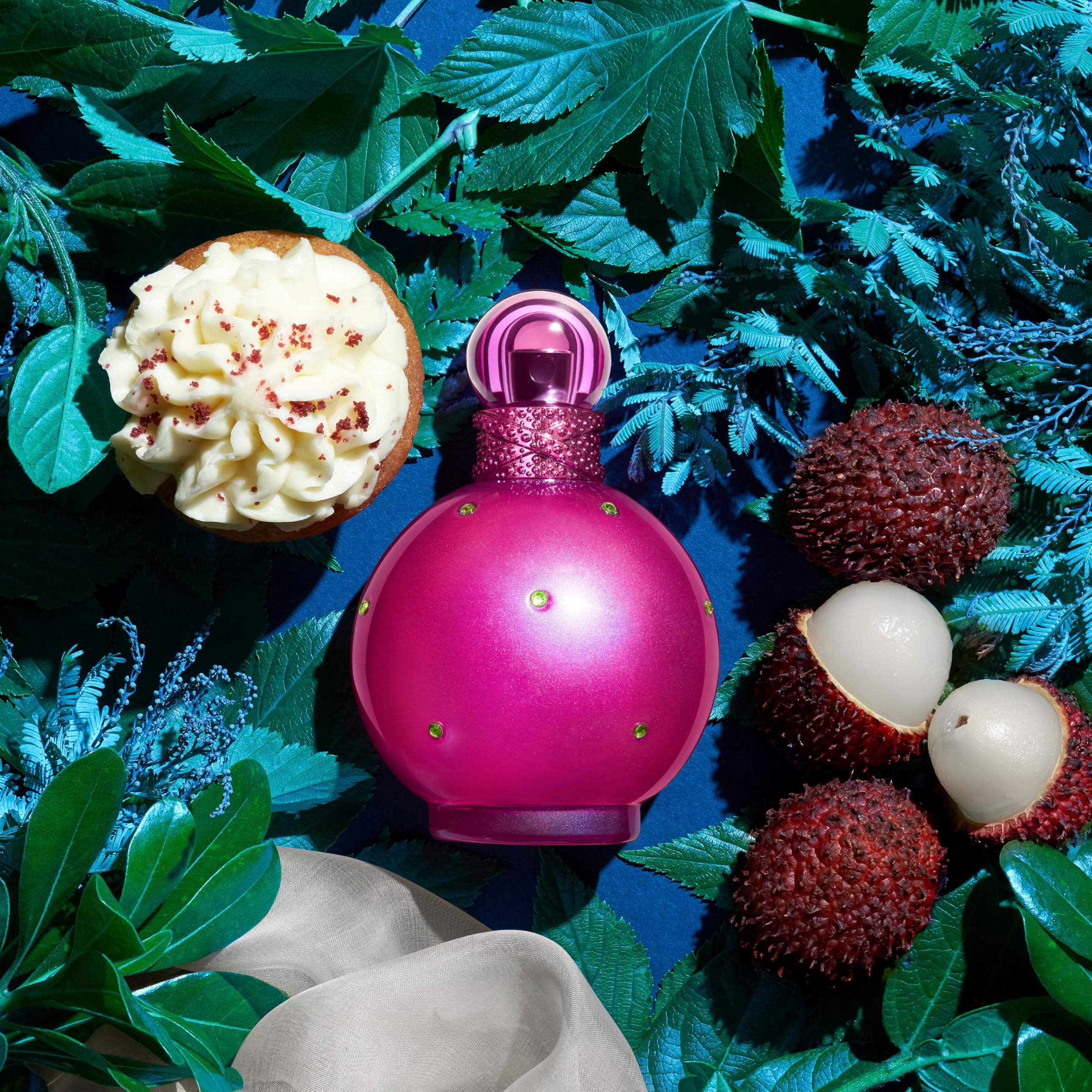Britney Spears Fantasy warm woods backdrop emphasizes depth and sophistication.