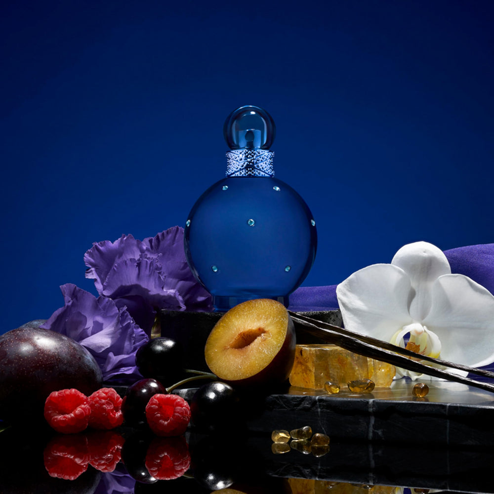 Britney Spears Midnight Fantasy blue bottle evokes evening allure and mystery.