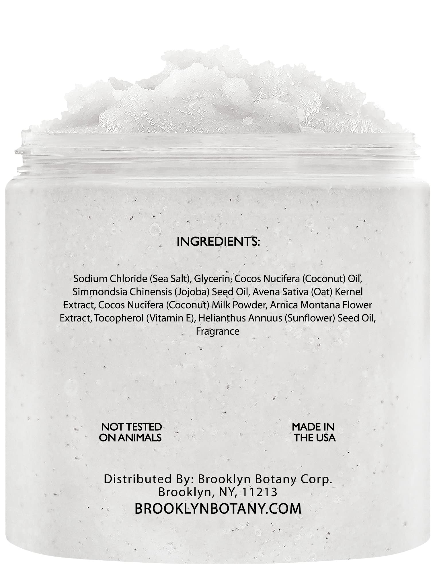 Brooklyn Botany Coconut Milk Body Scrub hand pouring a small amount for even application.