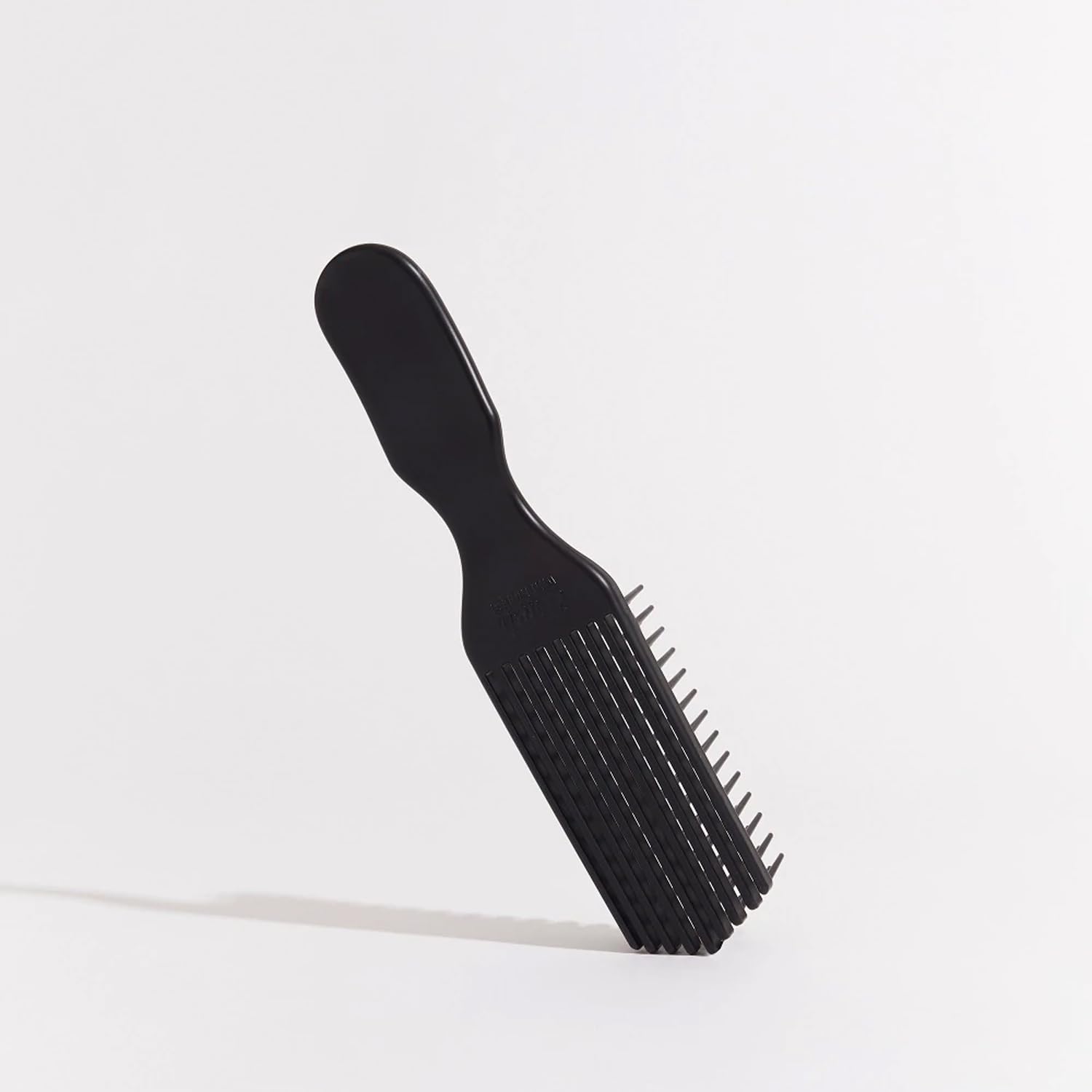 Brush With The Best detangler brush with a wide handle for comfortable grip.